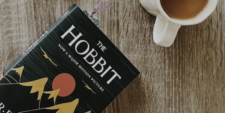 Hobbit book and cup of coffee.png